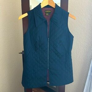 Ladie’s Quilted navy blue vest. Size 4